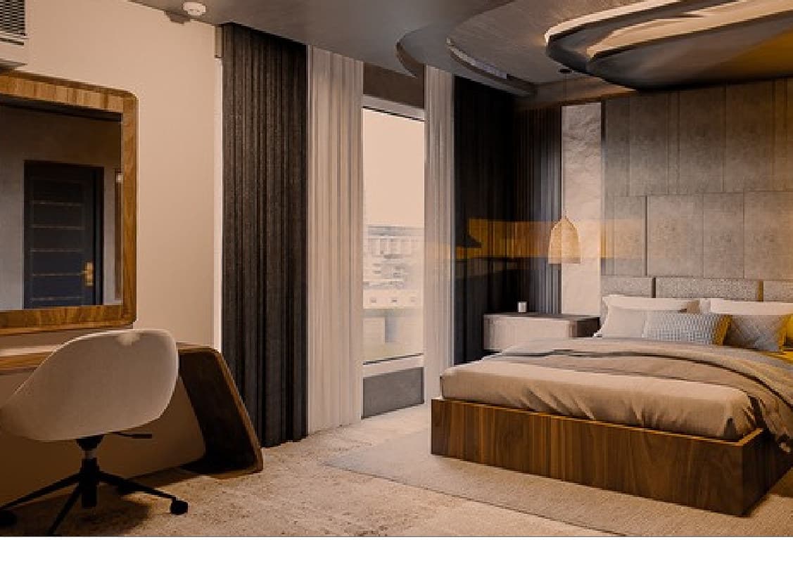 Hotel suite angle showing desk, bed, and city view