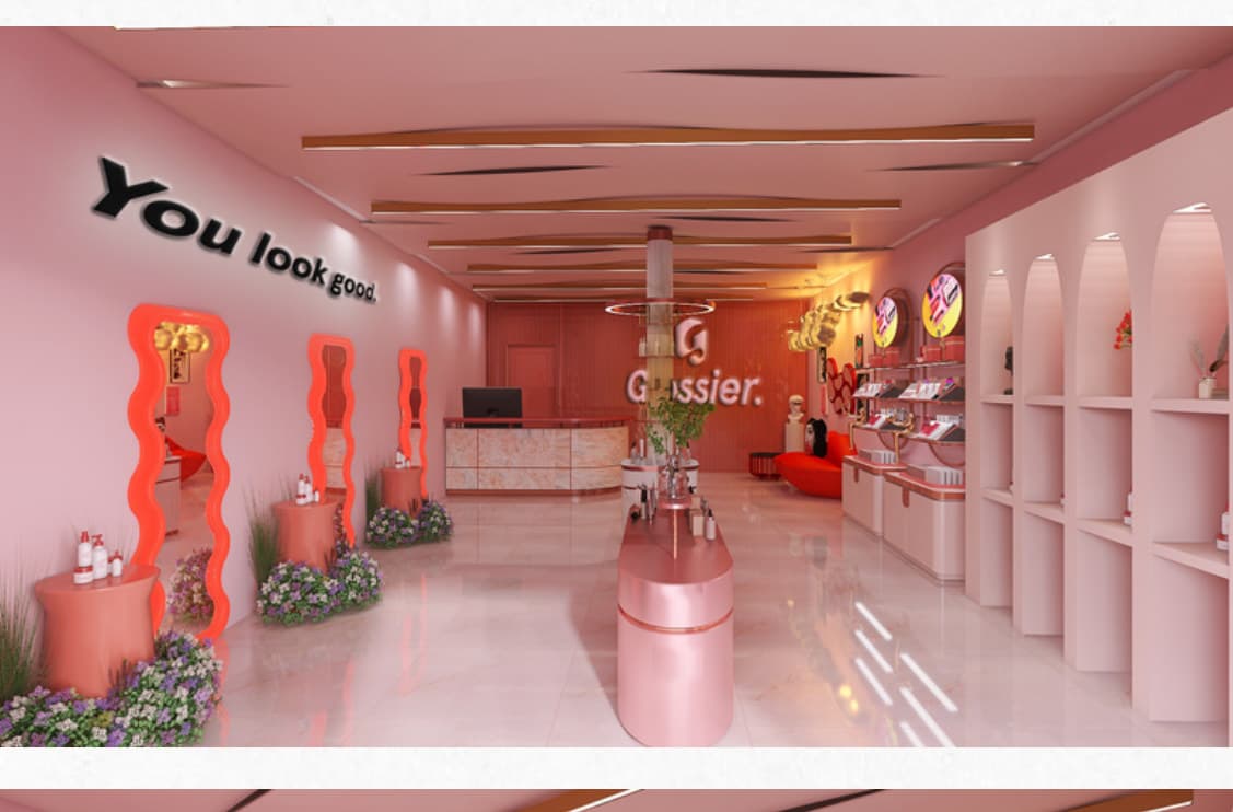 Retail perspective with wavy orange mirrors and marble counters
