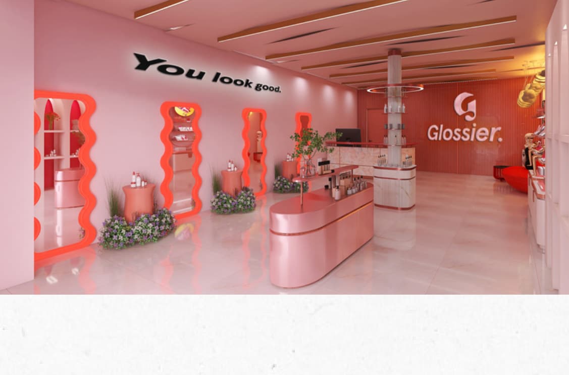 Store interior looking toward the Glossier service desk